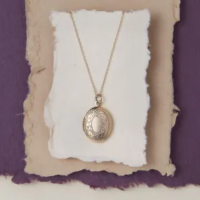 Oval Locket With Leaf Border