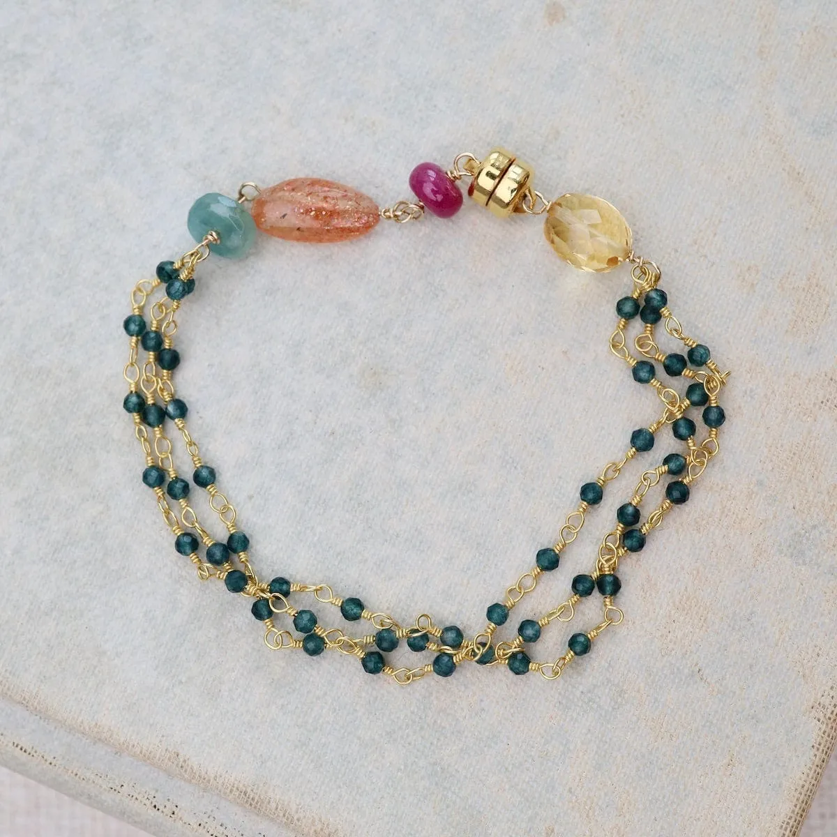 Three Strand Bracelet of Ruby, Citrine, Grandiederite